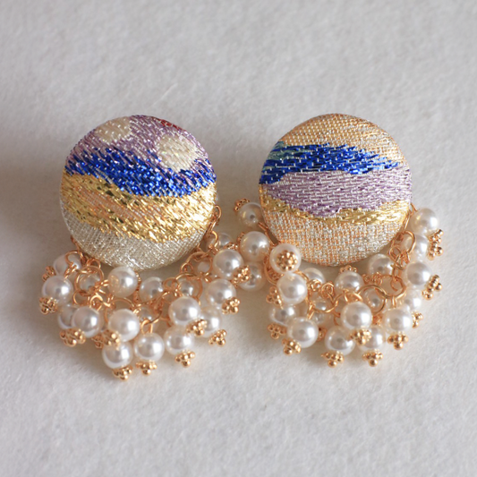 Earrings of multi color thread